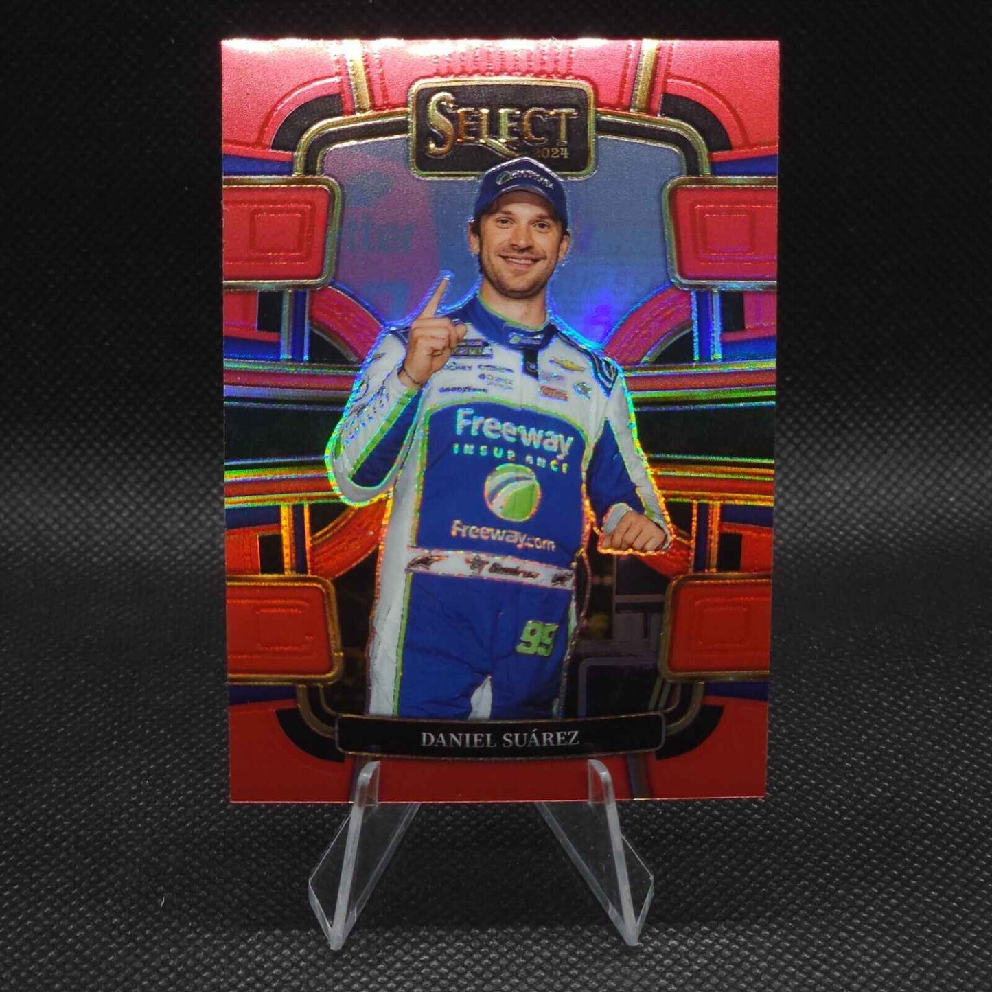 2024 Panini Select Racing Grandstand Red Prizm #14 Daniel Suarez 056/149